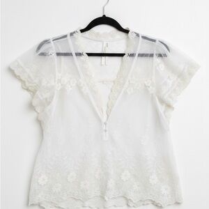 Anthropologie White floral Embroidered
Flutter-Sleeve Blouse